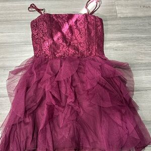 Semi-formal burgundy dress worn once size 11 fits on m/l clothing sized girl.